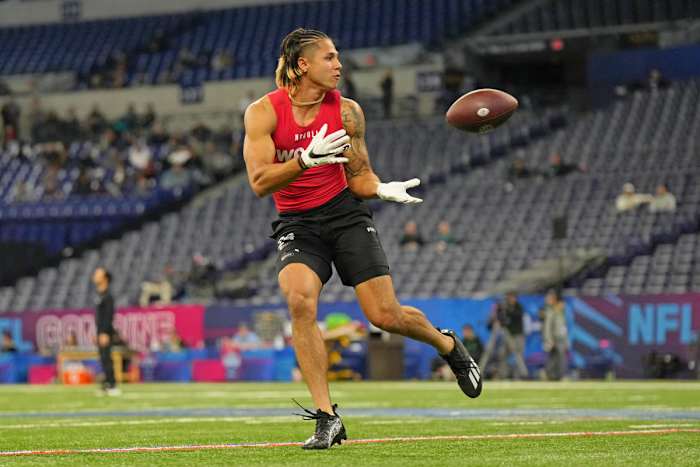 Princeton WR Andrei Iosivas catches a pass during NFL Combine drills